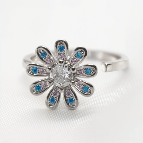 Pierścionek z obrotowym kwiatkiem, antystresowy, srebrny, regulowany