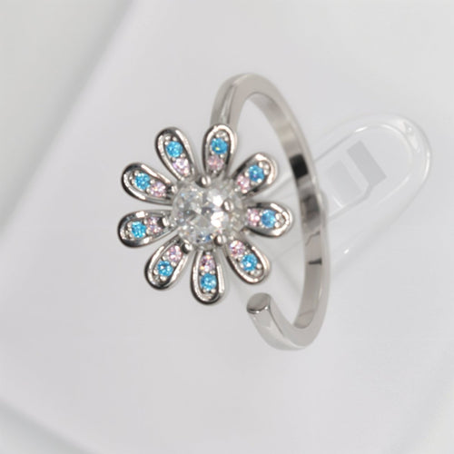 Pierścionek z obrotowym kwiatkiem, antystresowy, srebrny, regulowany